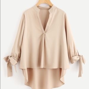 Hi low blouse. Tie ends. V neck front. Very flowy